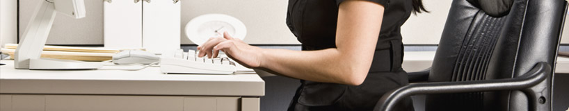 cropped photograph of a woman typing